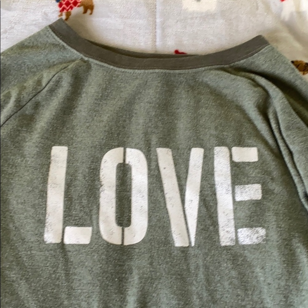 I am selling a navy green top